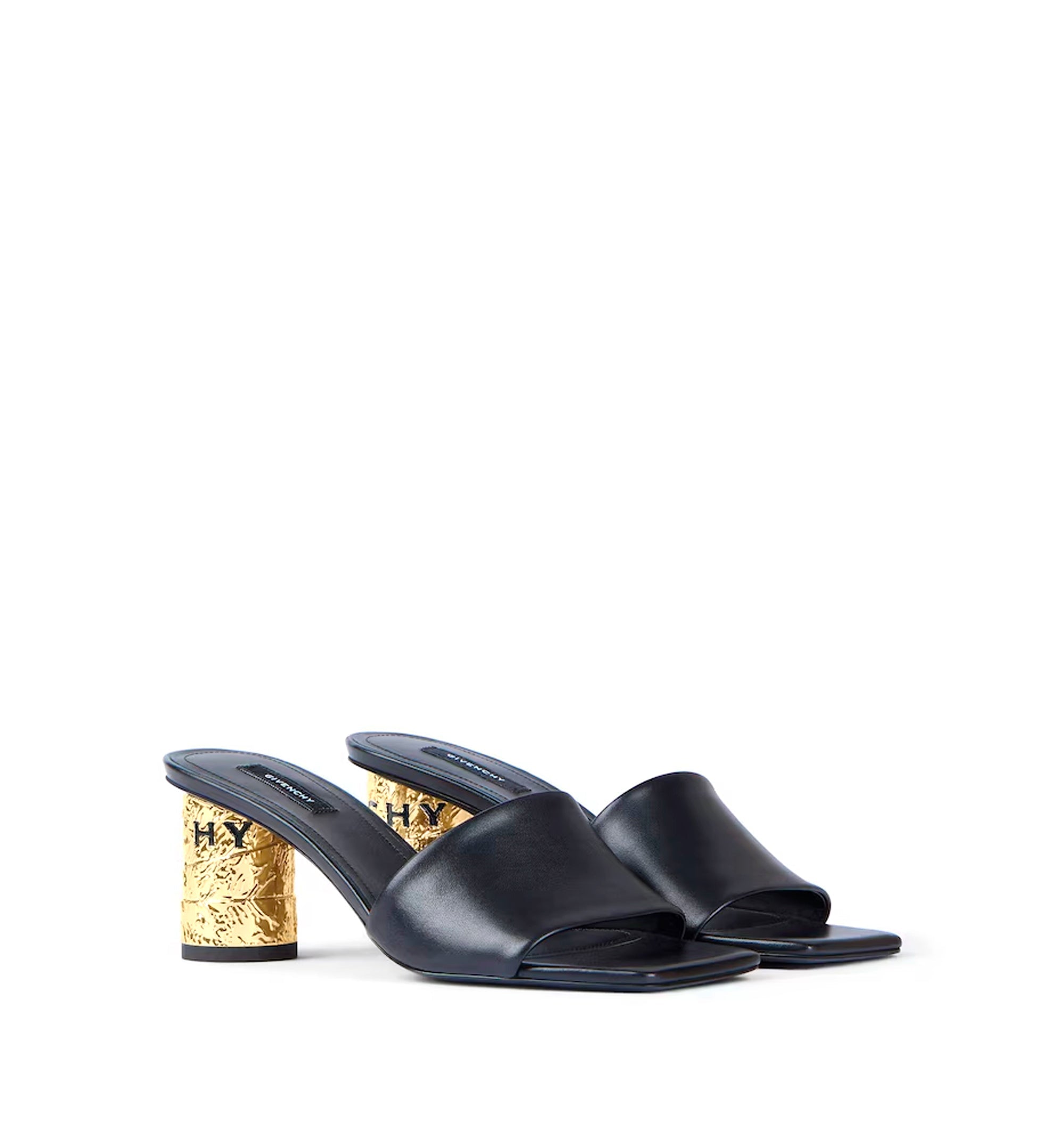 Tape heeled mules in leather