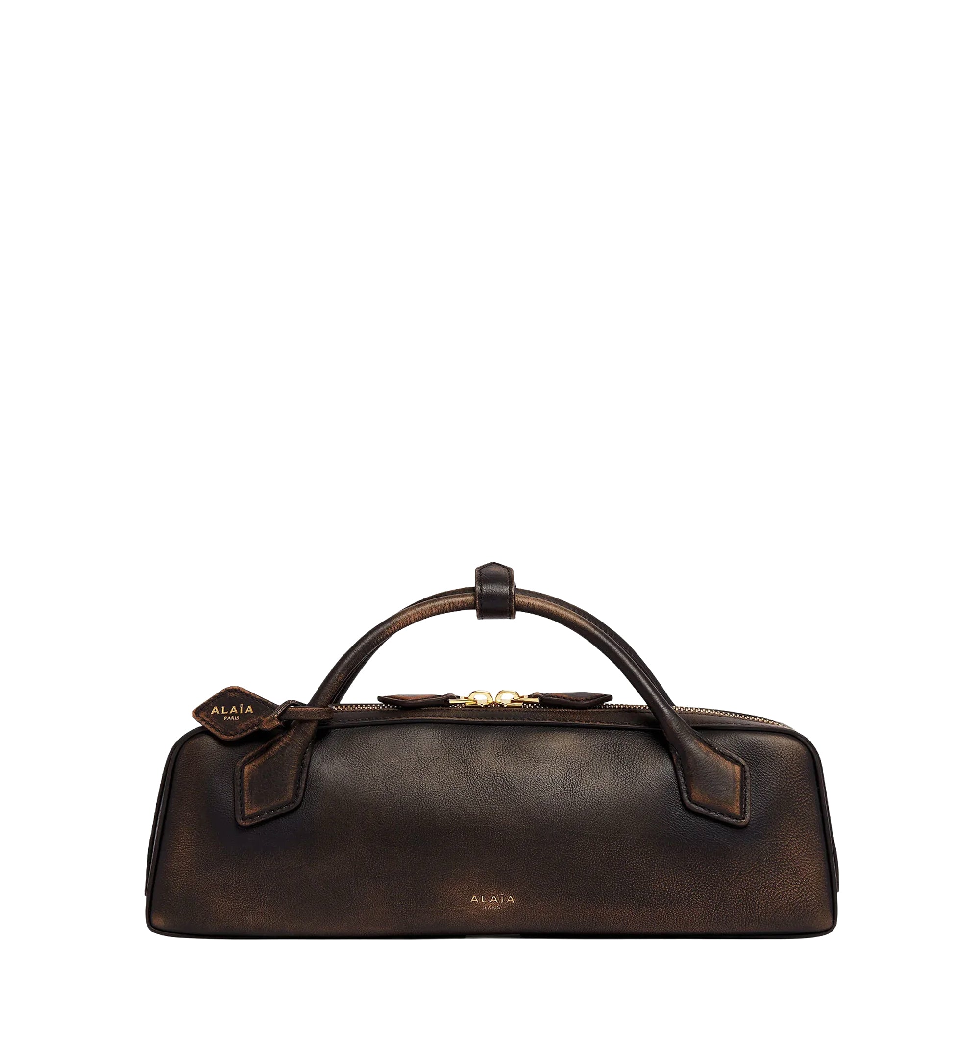 Le Teckel clutch in aged leather