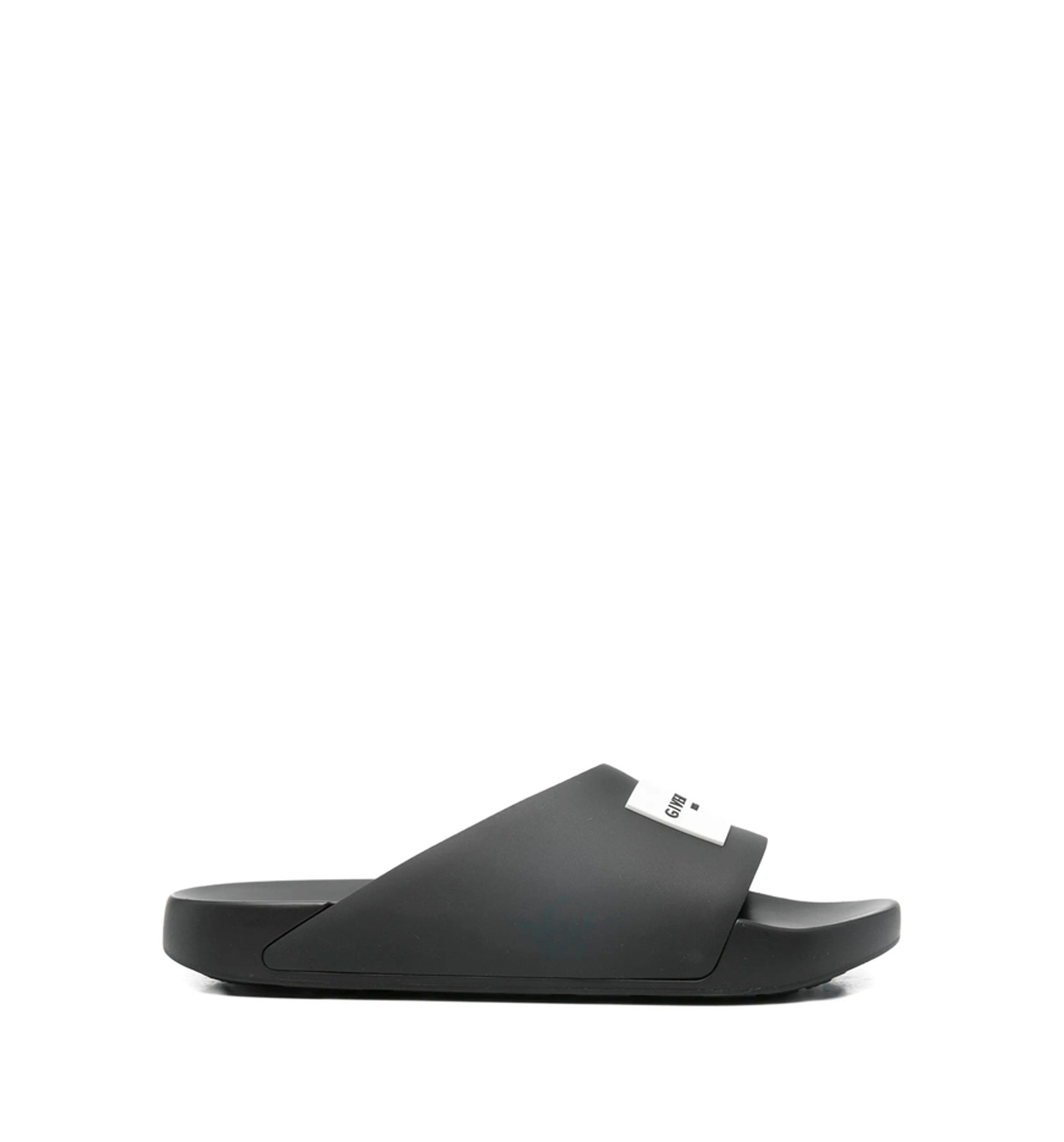 Label Slide mules in rubber