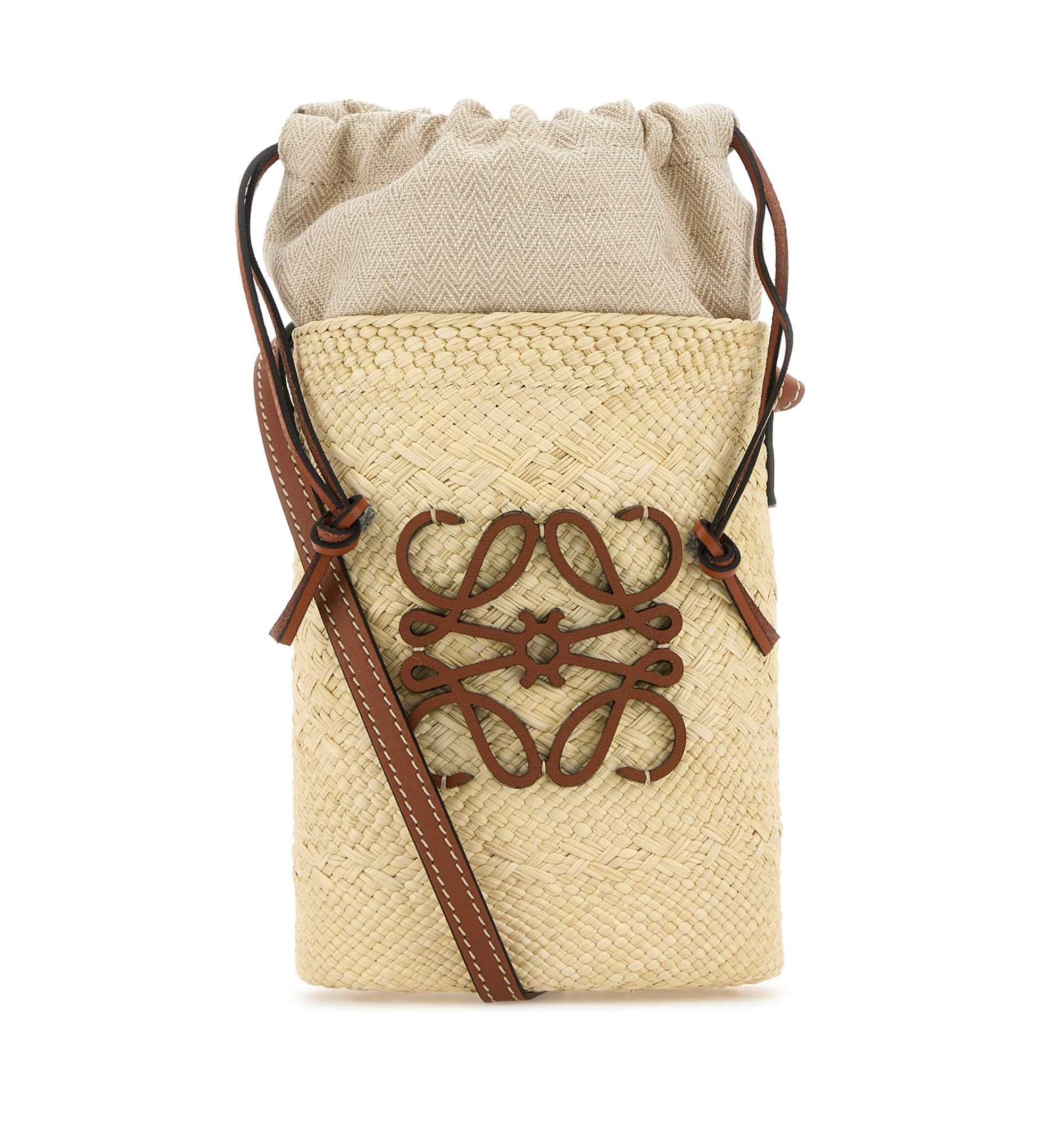 Square pocket in iraca palm and calfskin
